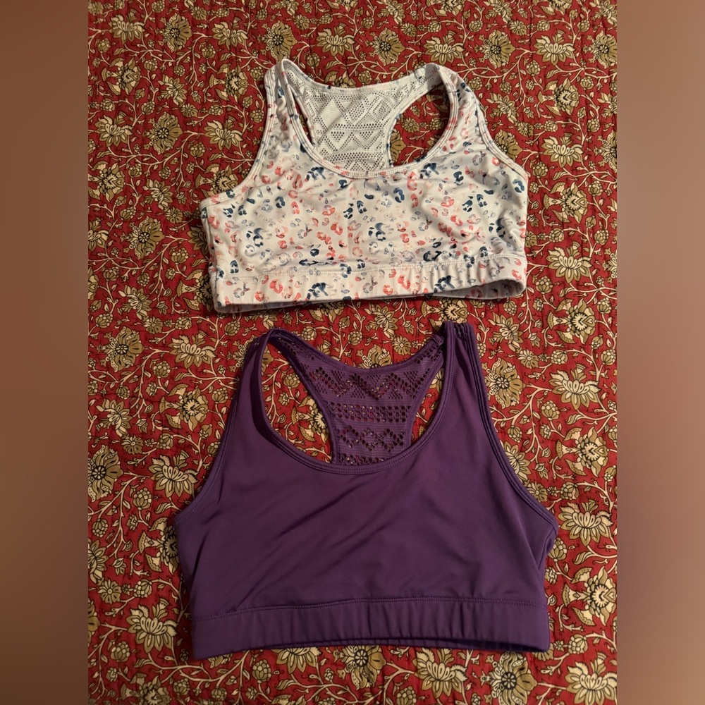 THREE Zyia Bomber Bras. Gently used. Great shape. Size L.